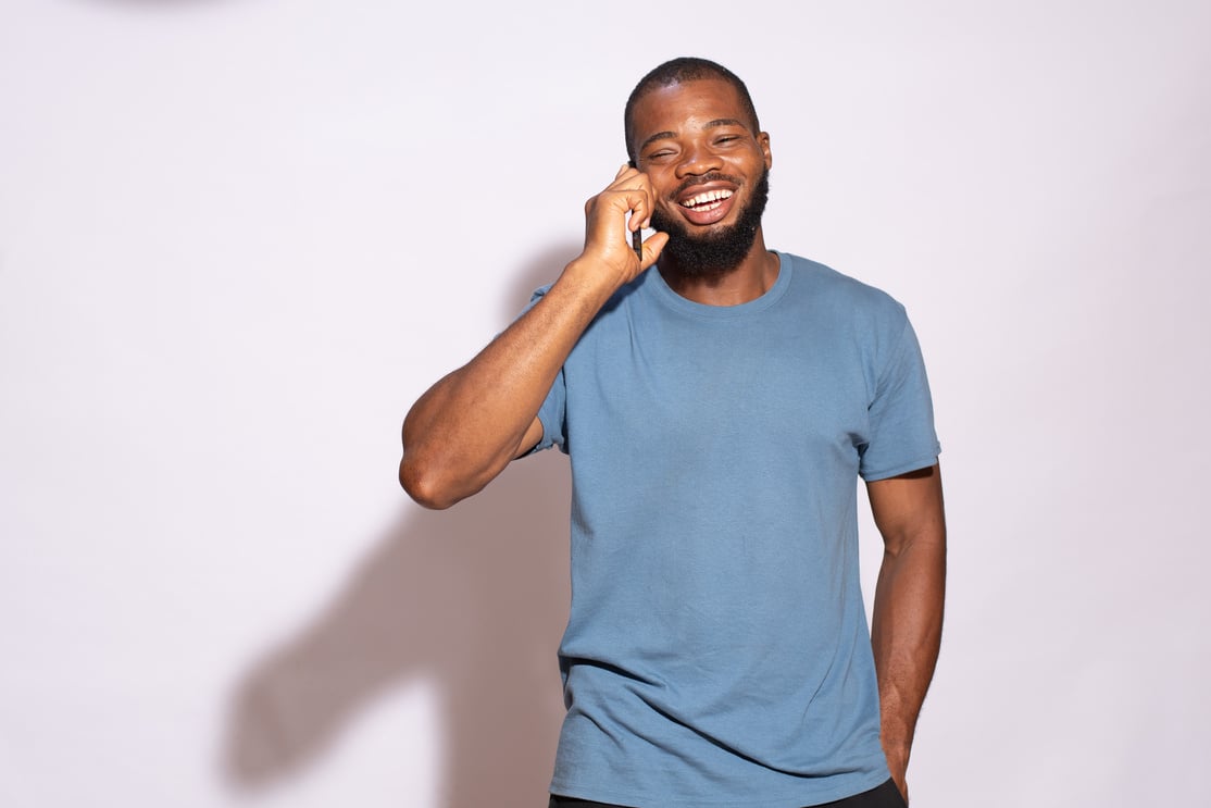 Man Making a Phone Call on White Background